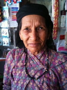 A Buddhist Nepali woman with her hair covered by a sort of cap - she definitely did not think it strange to see my hair covered!