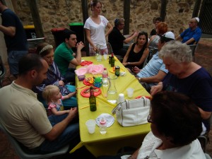 Jews eating kosher food on Purim in the Synagogue